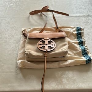 Tory Burch canvas with leather details.